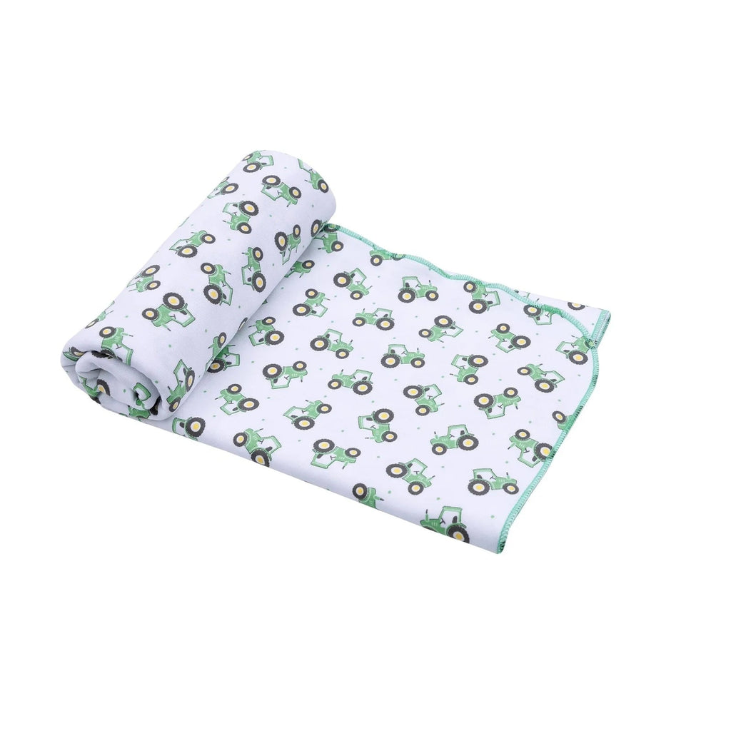 Magnolia Baby Lil' Green Tractor Printed Swaddle Blanket - Fun & Fancy Children's Boutique